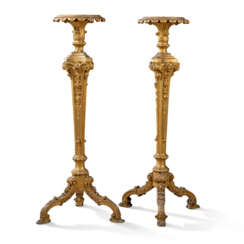 A PAIR OF GEORGE II GILTWOOD TORCHERES