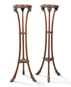 Torchère. A PAIR OF GEORGE III STYLE MAHOGANY TORCHERES