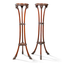 A PAIR OF GEORGE III STYLE MAHOGANY TORCHERES