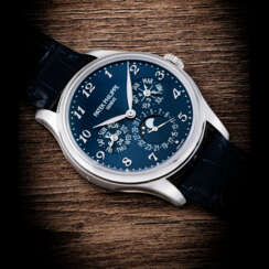PATEK PHILIPPE. AN 18K WHITE GOLD AUTOMATIC PERPETUAL CALENDAR WRISTWATCH WITH MOON PHASES, 24 HOUR, LEAP YEAR INDICATION AND BREGUET NUMERALS