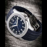PATEK PHILIPPE. AN 18K WHITE GOLD AUTOMATIC WRISTWATCH WITH SWEEP CENTRE SECONDS AND DATE - Foto 1