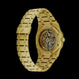 AUDEMARS PIGUET. AN 18K GOLD AUTOMATIC SKELETONISED PERPETUAL CALENDAR WRISTWATCH WITH MOON PHASES AND BRACELET - photo 2
