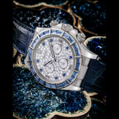 ROLEX. A VERY RARE 18K WHITE GOLD, DIAMOND AND SAPPHIRE-SET AUTOMATIC CHRONOGRAPH WRISTWATCH