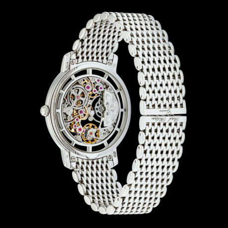 PATEK PHILIPPE. AN ATTRACTIVE 18K WHITE GOLD AUTOMATIC SKELETONISED WRISTWATCH WITH BRACELET - фото 2