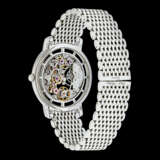 PATEK PHILIPPE. AN ATTRACTIVE 18K WHITE GOLD AUTOMATIC SKELETONISED WRISTWATCH WITH BRACELET - photo 2