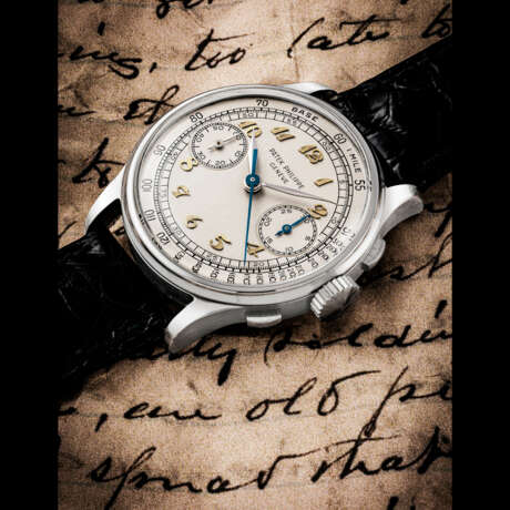 PATEK PHILIPPE. AN EXTREMELY RARE STAINLESS STEEL CHRONOGRAPH WRISTWATCH WITH GOLDEN BREGUET NUMERALS AND TACHYMETRE SCALE - photo 1