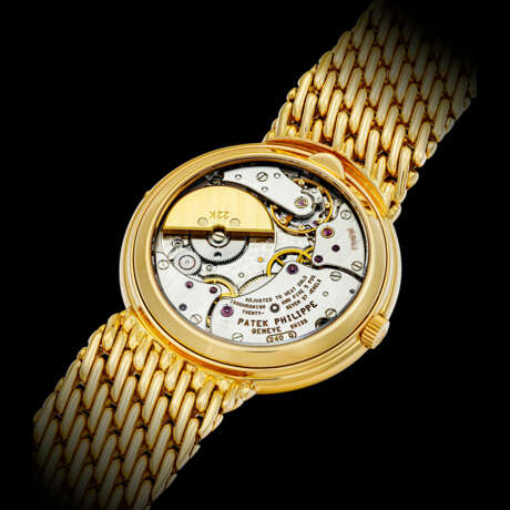 PATEK PHILIPPE. AN ATTRACTIVE 18K GOLD PERPETUAL CALENDAR CHRONOGRAPH BRACELET WATCH WITH MOON PHASES, 24 HOURS AND LEAP YEAR INDICATION - Foto 2