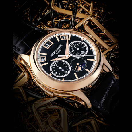 PATEK PHILIPPE. AN IMPORTANT AND HIGHLY COMPLICATED 18K PINK GOLD AUTOMATIC MINUTE REPEATING INSTANTANEOUS PERPETUAL CALENDAR SINGLE BUTTON CHRONOGRAPH WRISTWATCH WITH MOON PHASES, LEAP YEAR AND DAY/NIGHT INDICATION - фото 1