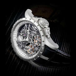 ROGER DUBUIS. A RARE 18K WHITE GOLD AND DIAMOND-SET LIMITED EDITION SKELETONISED DOUBLE TOURBILLION WRISTWATCH