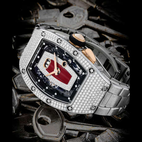 RICHARD MILLE. A LADY`S RARE 18K WHITE GOLD AND DIAMOND-SET TONNEAU-SHAPED AUTOMATIC SEMI-SKELETONISED WRISTWATCH WITH DATE - фото 1