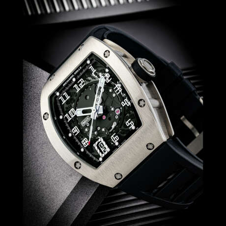 RICHARD MILLE. AN 18K WHITE GOLD AUTOMATIC SEMI-SKELETONISED WRISTWATCH WITH SWEEP CENTRE SECONDS AND DATE - photo 1