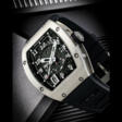 RICHARD MILLE. AN 18K WHITE GOLD AUTOMATIC SEMI-SKELETONISED WRISTWATCH WITH SWEEP CENTRE SECONDS AND DATE - Archives des enchères