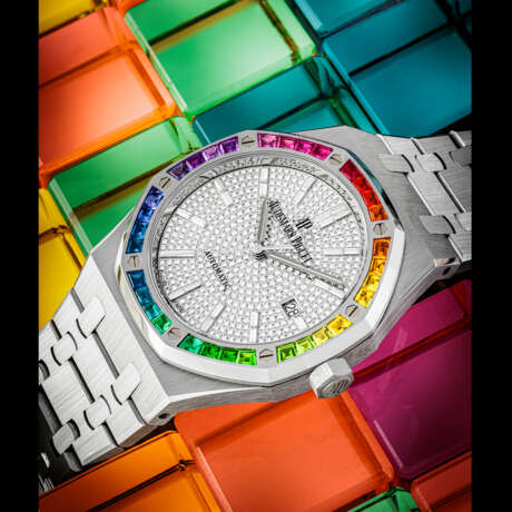 AUDEMARS PIGUET. AN EXTREMELY RARE AND MAGNIFICENT 18K WHITE GOLD, DIAMOND AND MULTI-COLOURED GEM-SET AUTOMATIC WRISTWATCH WITH SWEEP CENTRE SECONDS, DATE AND BRACELET - фото 1