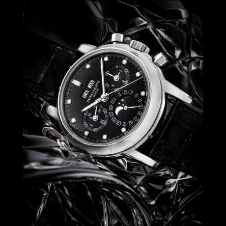 PATEK PHILIPPE. A RARE PLATINUM AND DIAMOND-SET PERPETUAL CALENDAR CHRONOGRAPH WRISTWATCH WITH MOON PHASES, 24-HOUR AND LEAP YEAR INDICATION - Foto 1