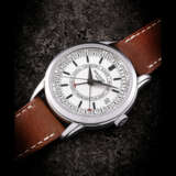 PATEK PHILIPPE. A STAINLESS STEEL AUTOMATIC WEEKLY CALENDAR WRISTWATCH - Foto 1
