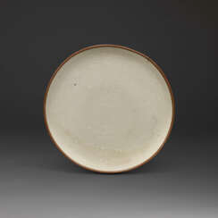 A VERY RARE DING IMPERIAL INSCRIBED MOULDED ‘MAKARA’ DISH