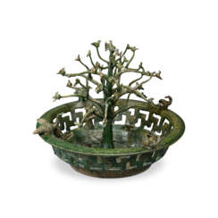 A GREEN-GLAZED POTTERY MODEL OF A HIBISCUS TREE