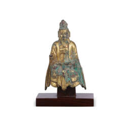 A VERY RARE AND FINELY CAST GILT-GRONZE FIGURE OF SEATED LAOZI