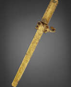 Invasions barbares. A EUROPEAN GOLD AND JEWEL-MOUNTED SCABBARD AND HANDLE