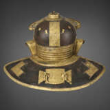 AN IMPORTANT ROMAN IRON, BRASS AND COPPER HELMET FOR JULIUS MANSUETUS, together with A DOLABRA - photo 1