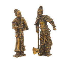 Paar asiatische Figuren aus Metall. 20. Jahrhundert.