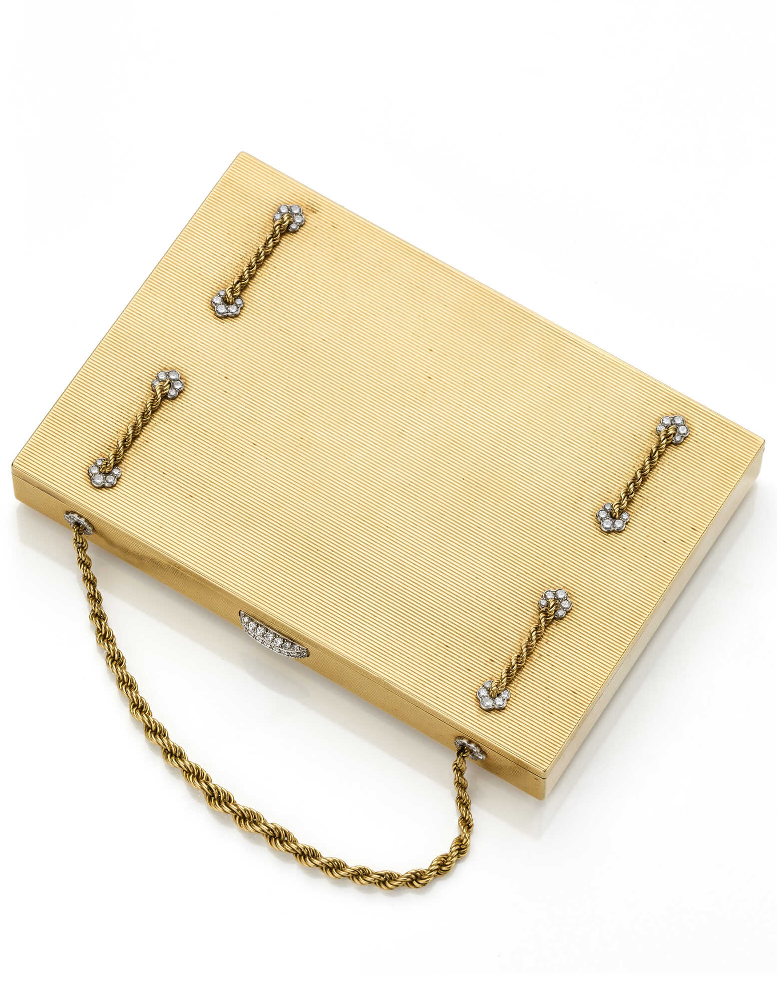 CARTIER | Yellow grooved gold minaudière with twis…