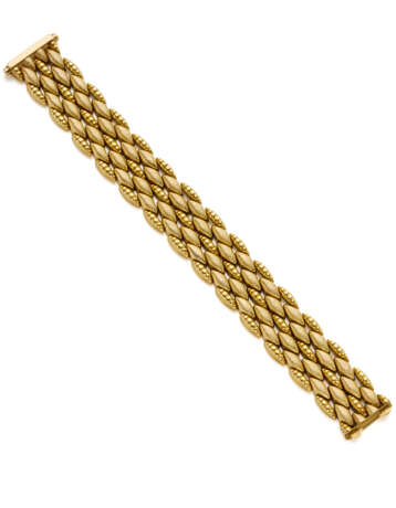 Partly knurled yellow gold modular bracelet, g 37.… - фото 1