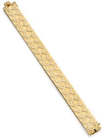 UNOAERRE | Bi-coloured chiseled gold band bracelet… - Foto 1