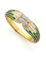 Sapphire, emerald, round and baguette diamond yell…