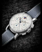 Art d'avant-guerre. UNIVERSAL. A RARE STAINLESS STEEL CHRONOGRAPH WRISTWATCH WITH TRIPLE CALENDAR AND MOON PHASES