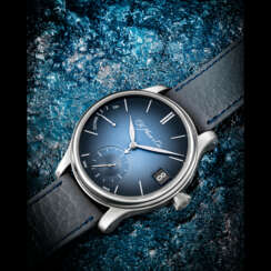 H. MOSER &amp; CIE. AN 18K WHITE GOLD PERPETUAL CALENDAR WRISTWATCH WITH POWER RESERVE AND LEAP YEAR INDICATION
