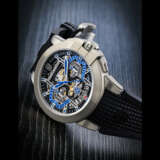 HARRY WINSTON. A ZALIUM LIMITED EDITION AUTOMATIC FLYBACK CHRONOGRAPH SEMI-SKELETONISED WRISTWATCH WITH DATE - Foto 1