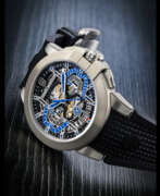 Flyback. HARRY WINSTON. A ZALIUM LIMITED EDITION AUTOMATIC FLYBACK CHRONOGRAPH SEMI-SKELETONISED WRISTWATCH WITH DATE