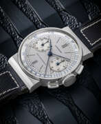 Longines. LONGINES. AN ATTRACTIVE AND RARE STAINLESS STEEL FLYBACK CHRONOGRAPH WRISTWATCH WITH TWO-TONE SILVERED DIAL
