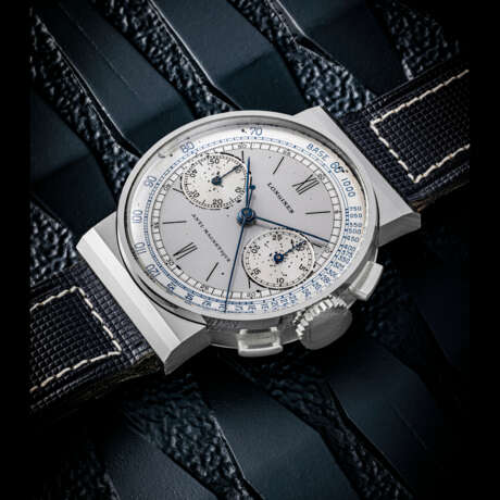 LONGINES. AN ATTRACTIVE AND RARE STAINLESS STEEL FLYBACK CHRONOGRAPH WRISTWATCH WITH TWO-TONE SILVERED DIAL - фото 1