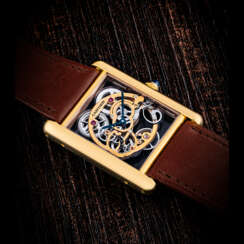 CARTIER. AN 18K PINK GOLD SKELETONISED WRISTWATCH