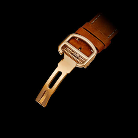 CARTIER. AN 18K PINK GOLD SKELETONISED WRISTWATCH - photo 2