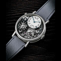 BREGUET. AN 18K WHITE GOLD SEMI-SKELETONISED WRISTWATCH WITH DUAL TIME AND DAY/NIGHT INDICATION