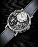 Двойной часовой пояс. BREGUET. AN 18K WHITE GOLD SEMI-SKELETONISED WRISTWATCH WITH DUAL TIME AND DAY/NIGHT INDICATION