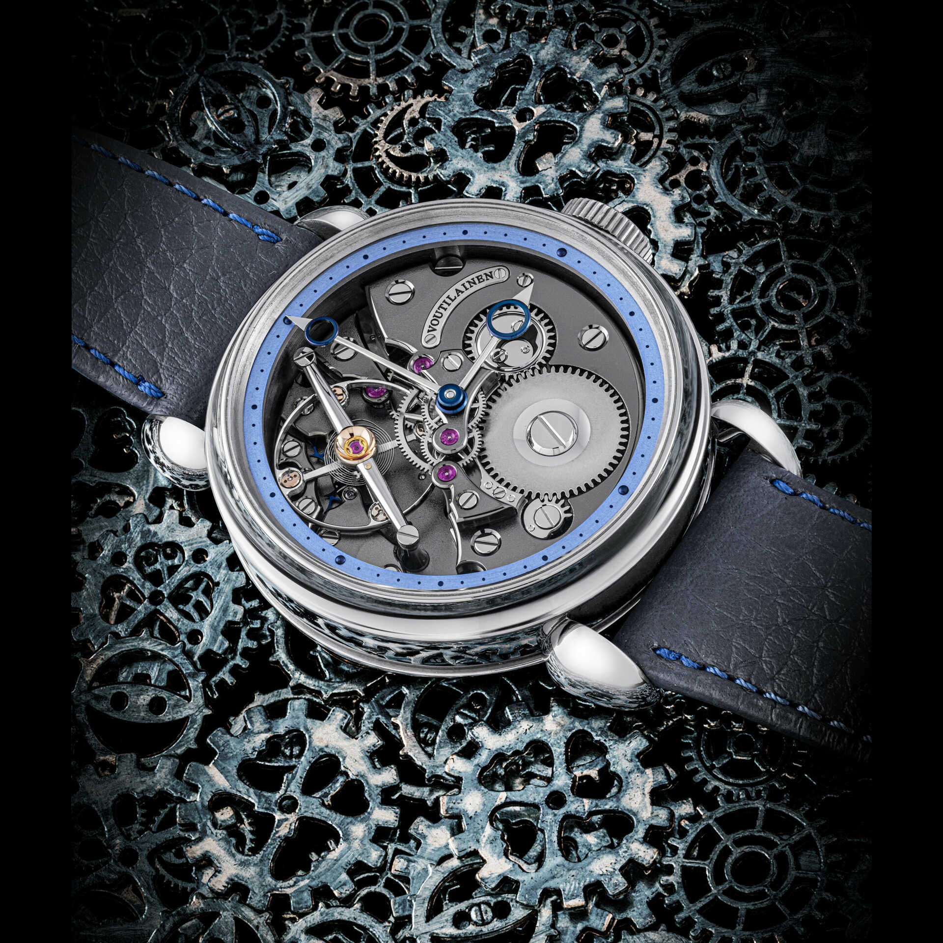 VOUTILAINEN. A VERY RARE TANTALUM LIMITED EDITION SEMI-SKELETONISED WRISTWATCH WITH POWER RESERVE