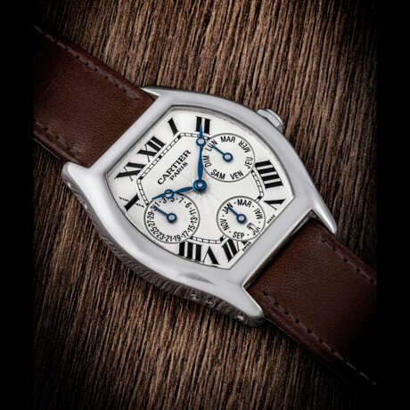 CARTIER. AN 18K WHITE GOLD TONNEAU SHAPED AUTOMATIC PERPETUAL CALENDAR WRISTWATCH WITH LEAP YEAR INDICATION - photo 1