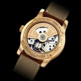 JAEGER-LECOULTRE. A RARE 18K PINK GOLD LIMITED EDITION AUTOMATIC TOURBILLON WRISTWATCH WITH DUAL TIME AND DATE - photo 2