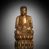 Zweiteilige Holzfigur des Buddha auf einem Lotus lackvergoldet - Foto 1