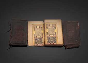 Koran und zwei geprägte Ledereinbände