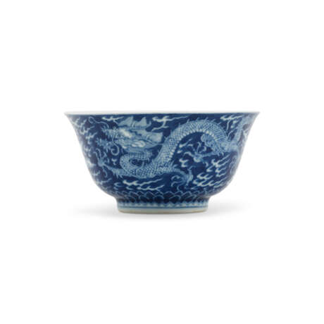 A REVERSE-DECORATED BLUE AND WHITE ‘DRAGON’ BOWL - photo 1