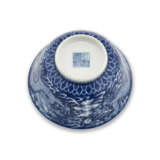 A REVERSE-DECORATED BLUE AND WHITE ‘DRAGON’ BOWL - photo 4