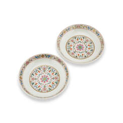 A PAIR OF YELLOW-GROUND FAMILLE ROSE ‘LOTUS’ DISHES