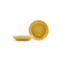 A PAIR OF SMALL YELLOW-ENAMELLED DISHES