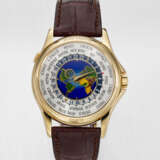 PATEK PHILIPPE. A RARE AND ATTRACTIVE 18K GOLD AUTOMATIC WORLD TIME WRISTWATCH WITH CLOISONNE ENAMEL DIAL - фото 1
