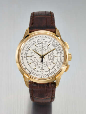 PATEK PHILIPPE. A RARE 18K YELLOW GOLD LIMITED EDITION AUTOMATIC MULTI-SCALE CHRONOGRAPH WRISTWATCH, MADE TO COMMEMORATE THE 175TH ANNIVERSARY OF PATEK PHILIPPE IN 2014 - photo 1